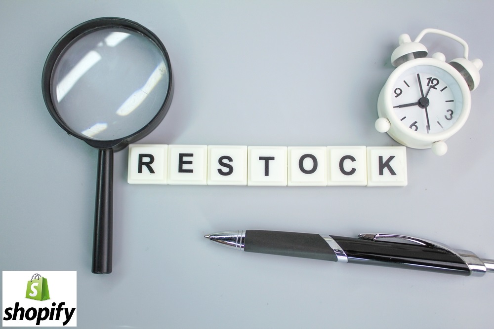 Small tiles spelling the word "restock" with a magnifying glass, pen, alarm clock, and the Shopify logo