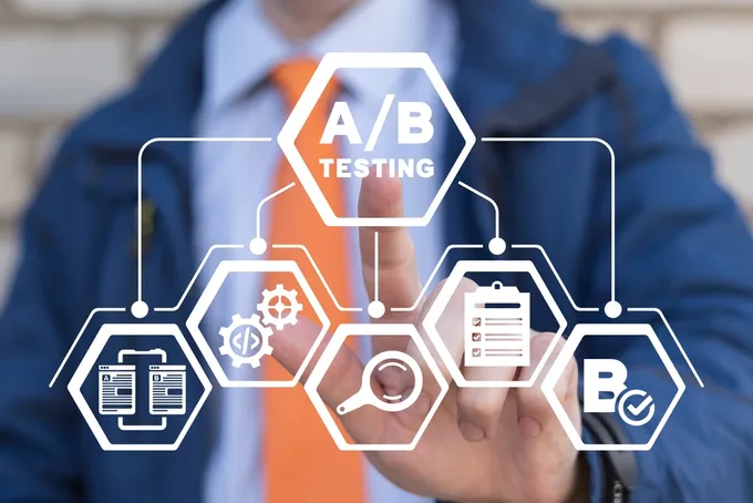 A man in a blue jacket is pointing to a graph breaking down the concept of A/B testing